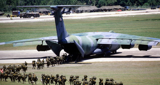 Soldiers of the US Army 82nd Airborne board a C-141B in the Caribbean for a flight back to Ft. Bragg during Ocean Venture ‘88